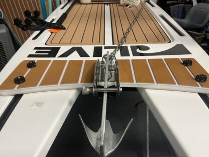 Featuring a 2.2 lb bruce anchor, 4' of stainless chain, 35' 1/4 line, stainless anchor pulpit drop w/ roller, plate mounted w/traction.